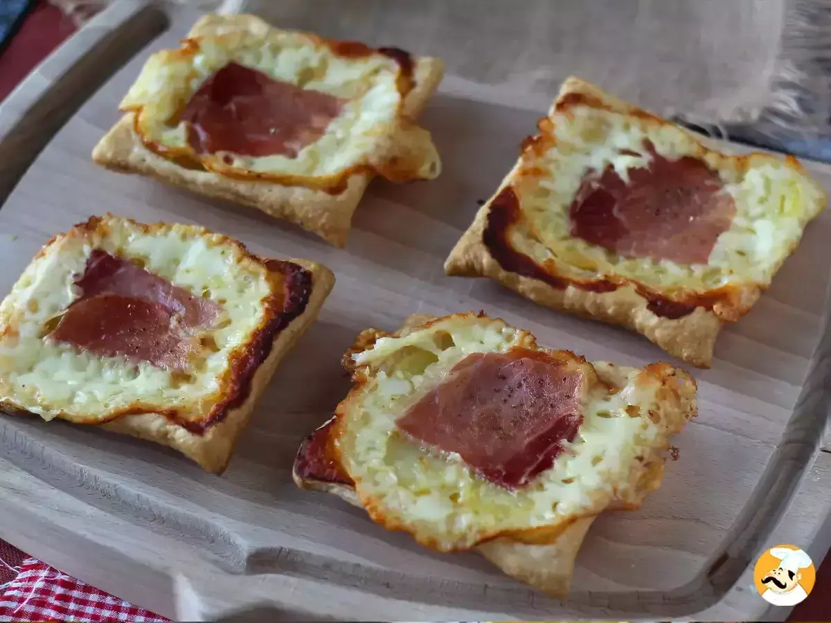 Sfogliatine salate con prosciutto e formaggio fuso, perfette per chi ama le ricette con formaggio.